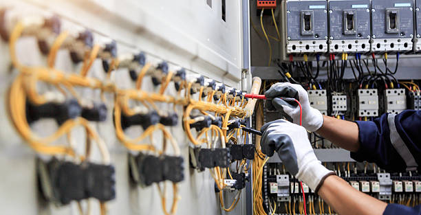 Professional Electrician technician working in Howard City, MI